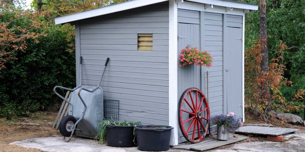 A grey garden shed